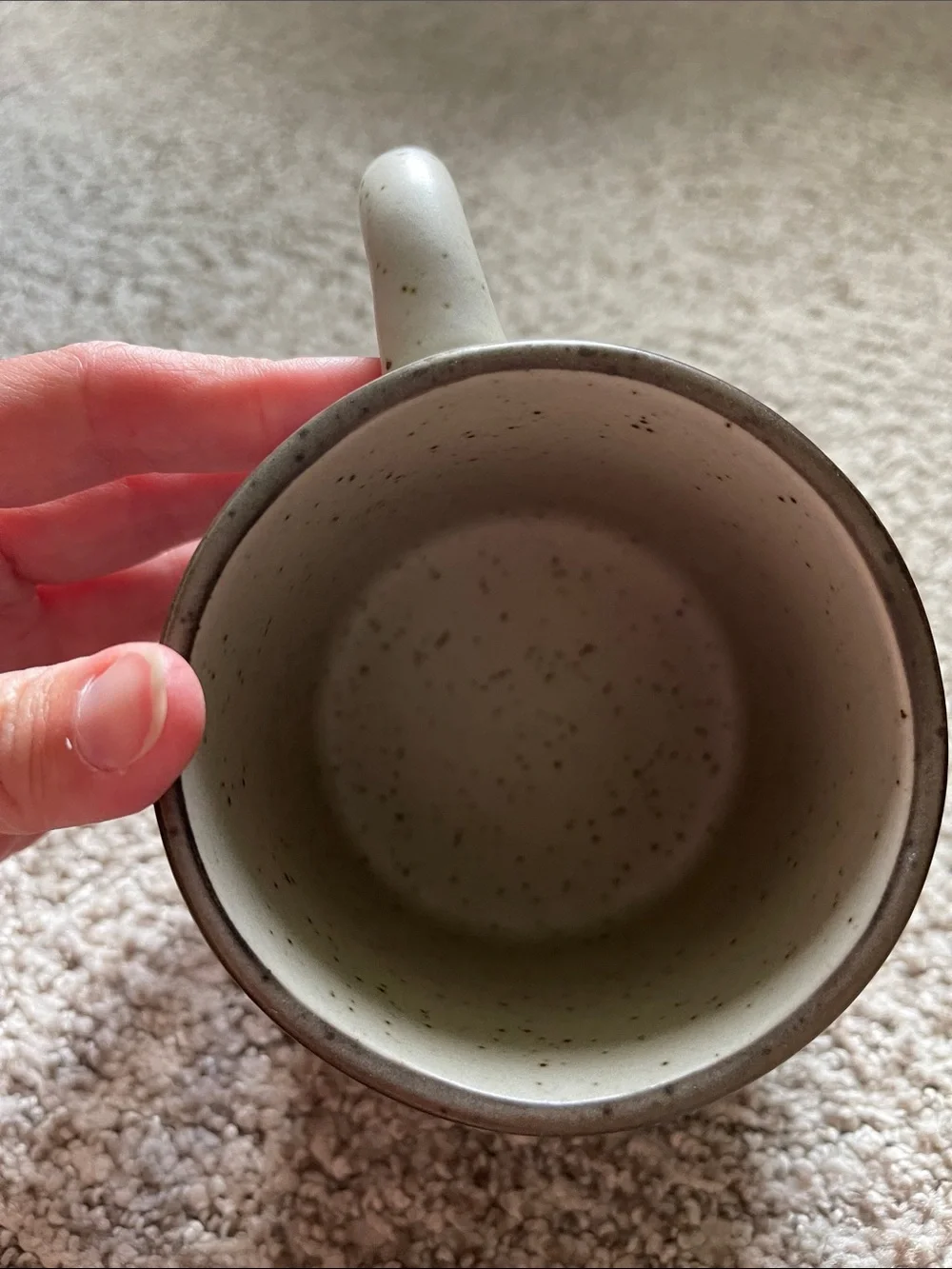 Speckled Ceramic Mug with Blue Floral Pattern